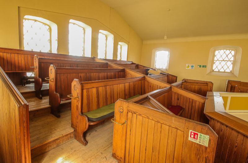 Pew seating on the upstairs balcony 