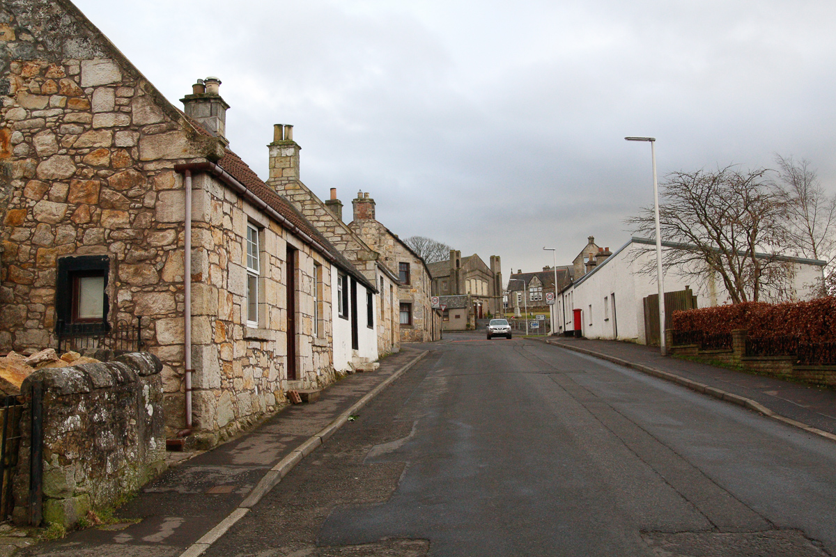 Shows church location in relation to old part of village and school