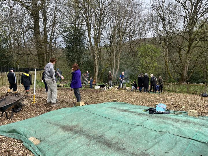An early open day with fire pit to introduce the community to the garden